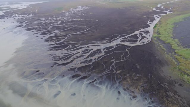 Aerial Panning Shot Of Full Frame Of Braided River Pattern - Heimaey, Iceland