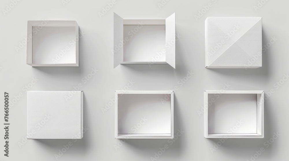 Poster collection of white boxes on a gray surface, suitable for product display
