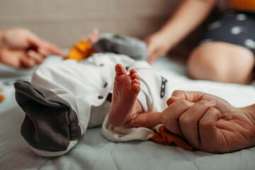 Close Up of Baby Laying on Bed