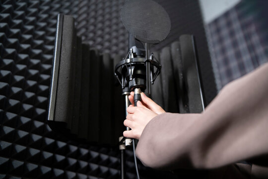 Musician Set Up plug in and adjust  Microphone in Soundproof Recording Studio