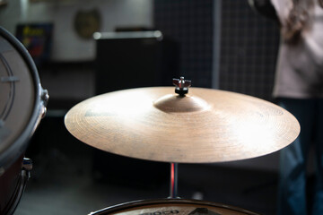 Close-Up View of a Drum Cymbal in a Music Studio Setting - 766503630