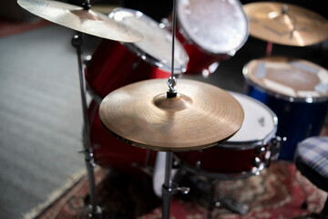 Fototapeta na wymiar Close-Up View of a Drum Cymbal in a Music Studio Setting