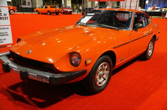 Philadelphia, Pennsylvania, U.S - January 14, 2024 - A bright red 1972 Datsun 240Z 4-Speed 2-door sports car