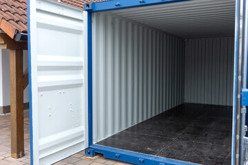 Open empty freight container ready to be loaded