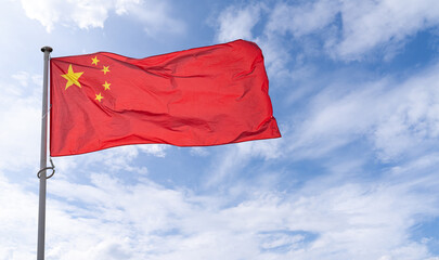Chinese flag is waving in wind. China symbol