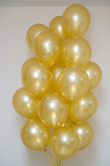 golden mother of pearl balloons in a bunch