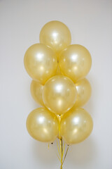 golden mother of pearl balloons in a bunch