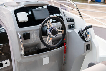 Cockpit of luxury yacht with dashboard.