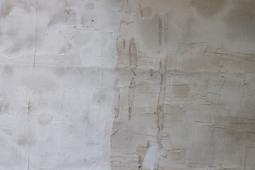 rough draft plaster stucco over reinforcement plastic mesh, full-frame background and texture.