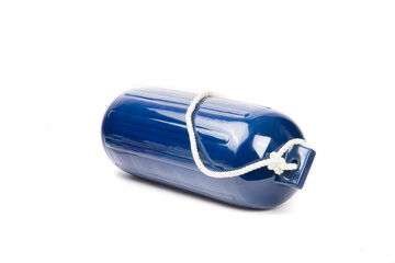 A blue inflatable plastic motor boat or sailboat fender with a white line isolated on white