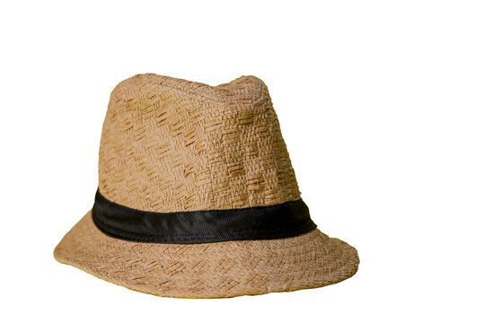 Straw hat on yellow background with summer theme. Space for text. Hat concept. Sombrero concept.