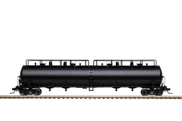 A Large Black Railroad Tank Car On Train Track.