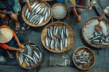 Obraz na płótnie Canvas Vietnam traditional fish market people selling fresh fish on the sidewalk