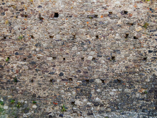 medieval stone masonry of castle wall. grunge architectural background