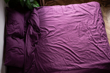 set of  bed linen on the bed in the bedroom daylight textile