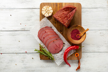 top view smoked cold meat slices and spices delicacy - 766570021