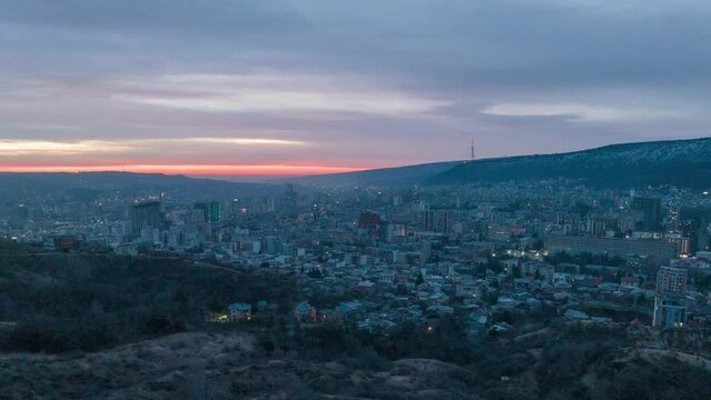 Morning cityscape of Tbilisi city. Aerial hyperlapse