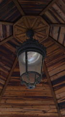 Fototapeta na wymiar Elegant Vintage Lantern on Textured Wood