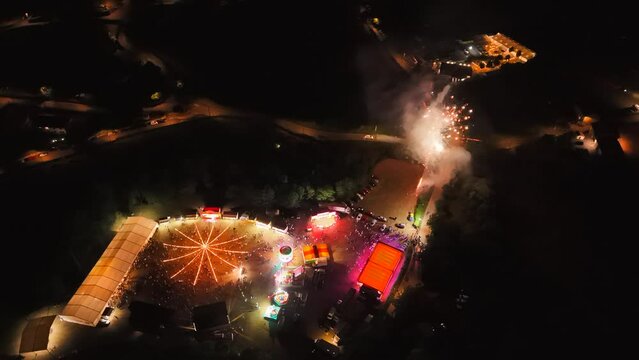 Aerial view of a night party with fireworks