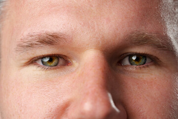 Fototapeta premium Close up shot of a young man face