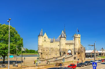 Foto op Canvas Het Steen medieval fortress, stone castle with towers on bank of Scheldt river in Antwerp city historical centre, Antwerpen old town, Flemish Region, Belgium © Aliaksandr