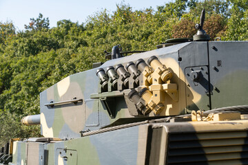 Modern German-made Leopard 2A4 tank camouflaged turret equipped with fog launchers