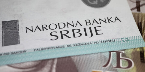 Closeup of old currency banknote with lettering of Ational bank of Serbia - obrazy, fototapety, plakaty