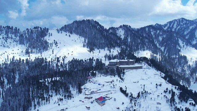 Drone view of Malam Jabba Hill station, Ski slope and resort, and pearl continental hotel in the middle of Himalayan Mountains, covered in snow during winter, Swat Khyber Pakhtunkhwa Pakistan