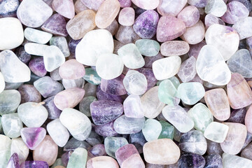 Closeup of various colorful stones quartz, marbles, ore minerals, gems use as ornament and...