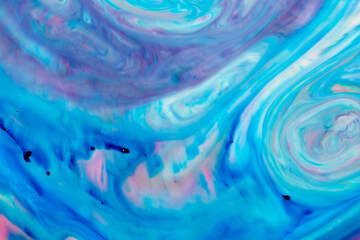 Closeup abstract color mixing of acrylic for use as background. Acrylic texture with marble pattern, blue marbling background 
