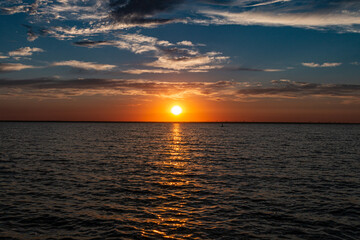 Sunset over Lake Newell with contrasting clouds