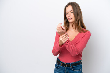 Young caucasian woman isolated on white background suffering from pain in hands