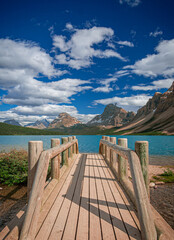 Bridge over glacial water on Bow Lake in Banff National Park