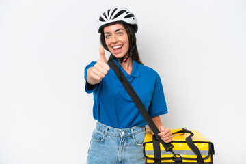 Young caucasian woman with thermal backpack isolated on white background with thumbs up because something good has happened
