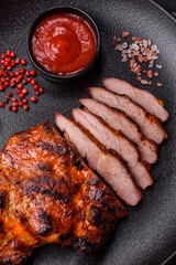 Fresh juicy delicious beef steak on a dark background