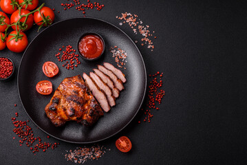 Fresh juicy delicious beef steak on a dark background