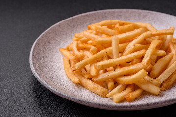 Delicious crispy golden fries with salt and spices