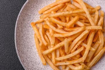 Delicious crispy golden fries with salt and spices
