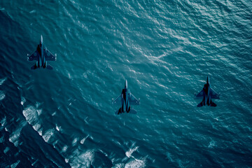Fighter jets soar over the sea