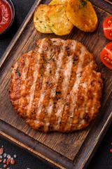 Delicious fresh grilled chicken fillet with spices and herbs