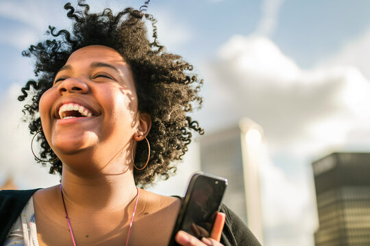 Happy woman using cell phone