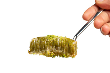 Pistachio baklava isolated on white background. Sherbet dessert. Baklava with pistachios and syrup