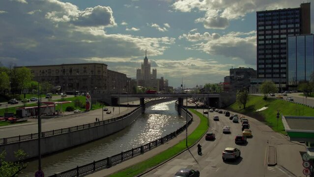 A captivating aerial view of Moscow's bustling city center and its picturesque surroundings, captured gracefully by a drone. The footage showcases iconic landmarks and urban landscapes