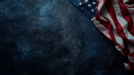 Fotobehang The concept of Independence Day in the USA. The American flag on a dark blue background. The location of the text, the business concept. © Надежда Измайлова
