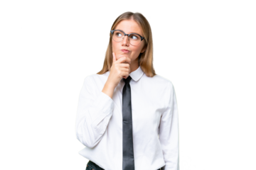 Young business caucasian woman over isolated background having doubts and with confuse face expression