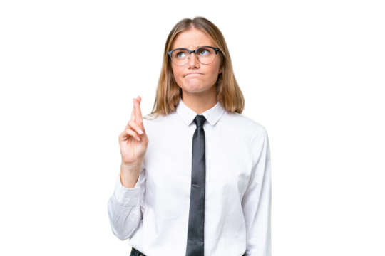 Young business caucasian woman over isolated background with fingers crossing and wishing the best