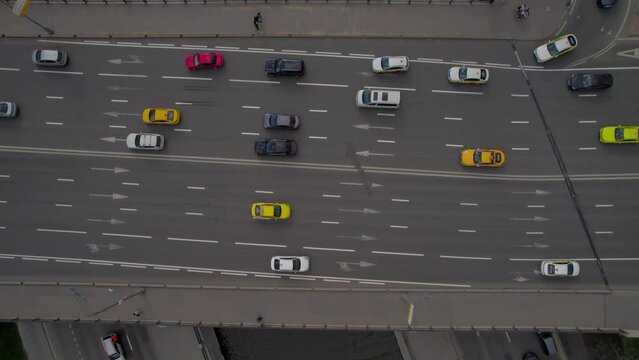 A captivating aerial view of Moscow's bustling city center and its picturesque surroundings, captured gracefully by a drone. The footage showcases iconic landmarks and urban landscapes