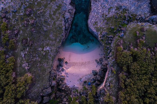 Aerial HDR top view of Anse Bouteille during sunrise in Rodrigues island	