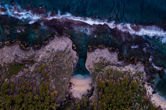 Aerial top view of Anse Bouteille during sunrise in Rodrigues island