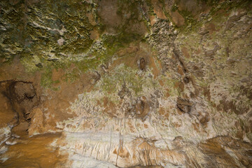 Speleology. The Bacho Kiro cave, Dryanovo, Bulgaria. Stalactite, and stalagmite speleothem formations.